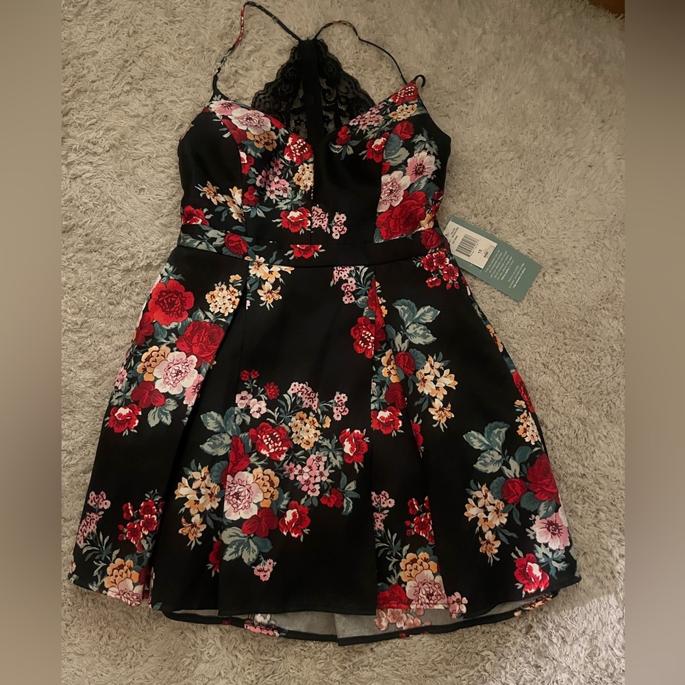 B. Smart Black Dress with Red and Pink Floral Design